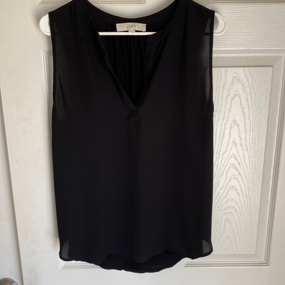 Black sleeveless blouse